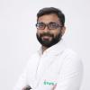 Dr. Kiran  J