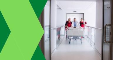 A website banner for Fortis Hospital in Mumbai with the title "Emergency Response" written in bold font above an image of a team of medical professionals in emergency response gear, ready to provide assistance.