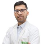 Dr. Ashish  George