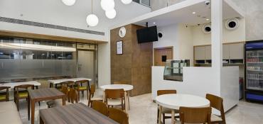 Hospital Cafeteria – Clean and hygienic dining area serving fresh meals for patients & visitors.