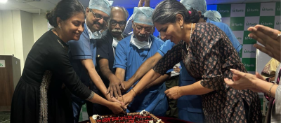 the eminent doctors cutting the cake for the celebration 